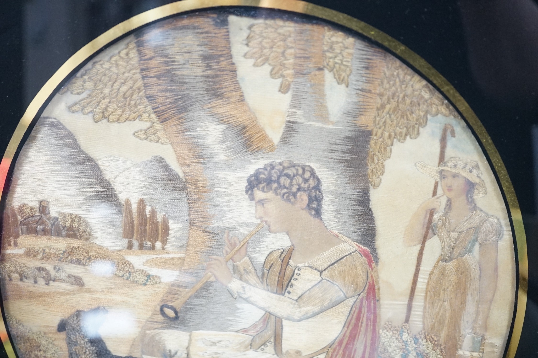 A framed Regency silkwork picture